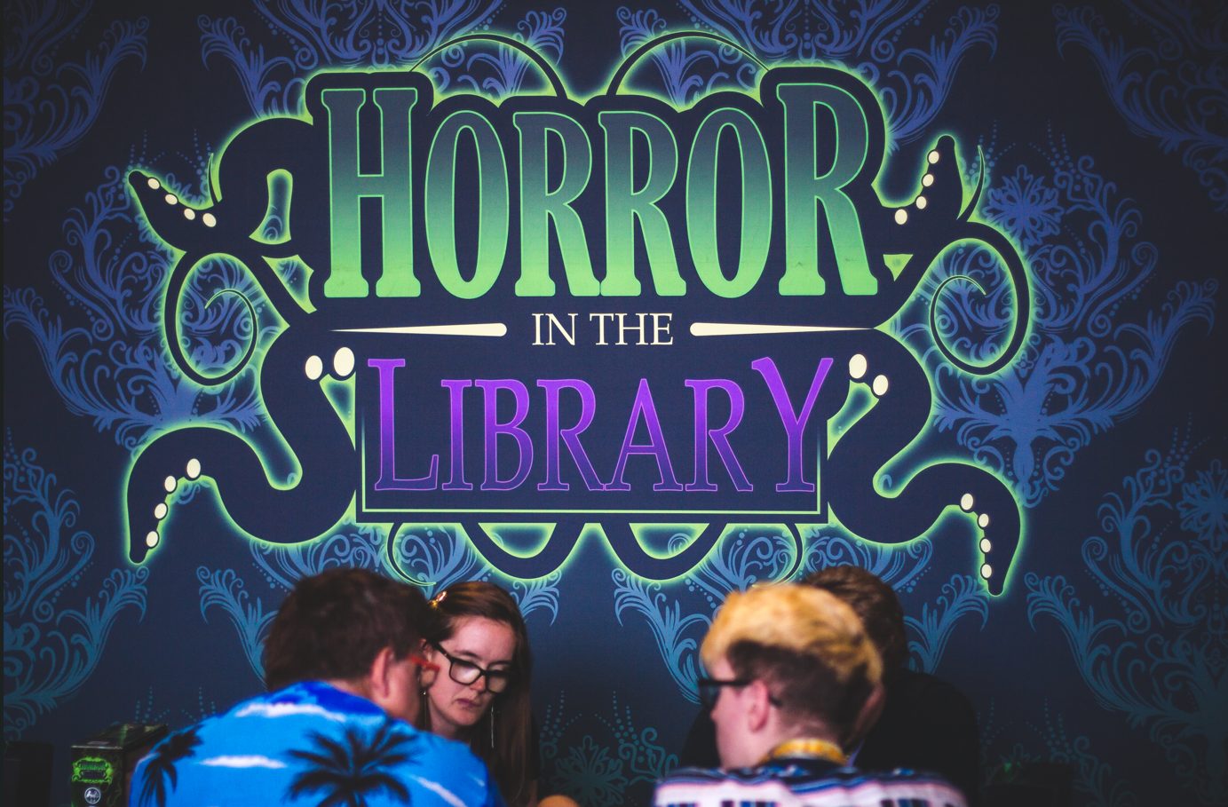 Horror in the Library being played at an event